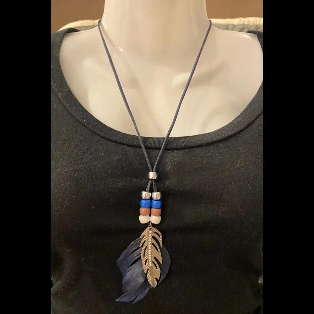 Vintage Handmade Blue Feather/Silver tone Leaf on a blue leather Rope Ne… - Picture 1 of 1